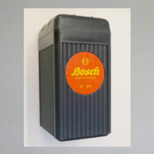 Batteriegehäuse leer, schwarzes Kunststoffgehäuse mit Deckel und Beschriftung "Bosch"